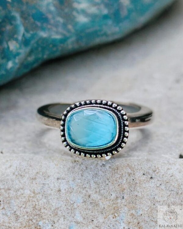 Ethnic oxidised ring featuring a vibrant turquoise stone and antique design