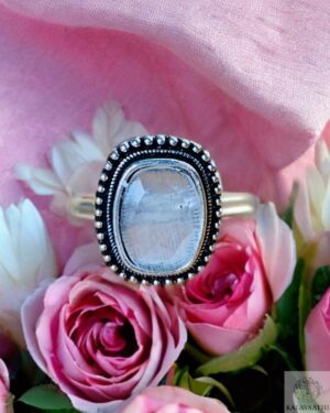 Silver-toned oxidised ring with moonlight white stone in a clean rectangular shape