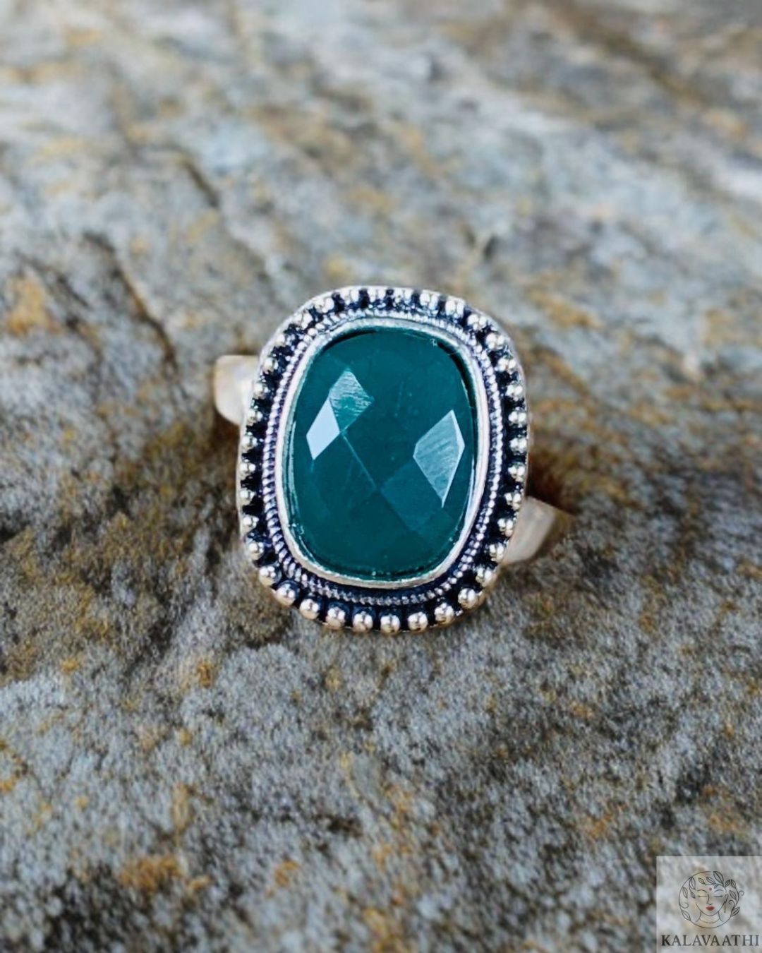 Traditional oxidised silver ring with bold green centrepiece