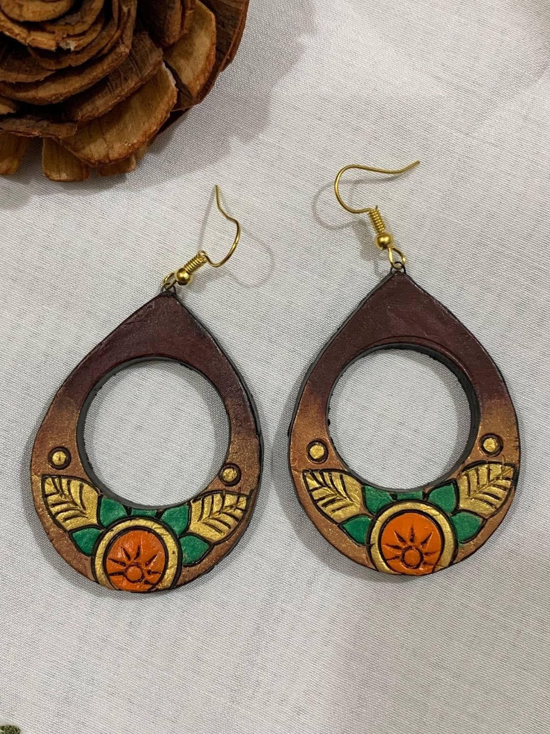 Terracotta Teardrop Earrings with Sun Motif & Leaf Design