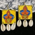 Handcrafted Durga Motif Earrings with Cowrie Shells