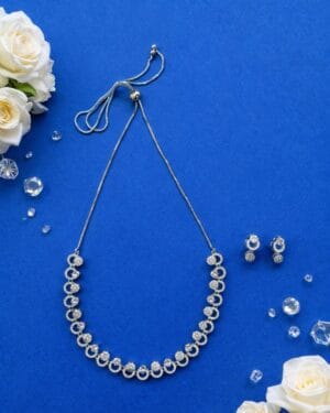 AD stone necklace and earrings set with circular diamond design, adjustable American diamond jewellery for women