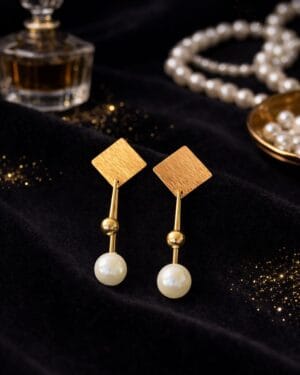 Gold tone geometric pearl drop earrings with square stud design, modern minimalist jewelry