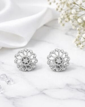Sterling silver floral stud earrings with intricate sunburst design, elegant minimalist silver jewelry