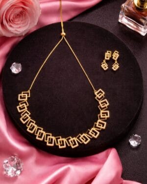 Gold tone American diamond geometric necklace and earrings set with square design, adjustable AD party wear jewellery for women