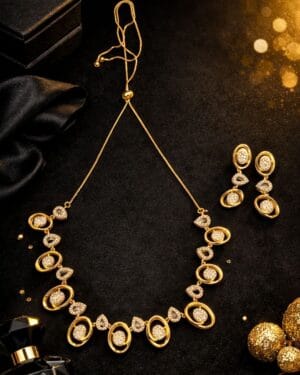 Gold tone American diamond oval necklace and earrings set with adjustable chain, elegant AD party wear jewellery for women