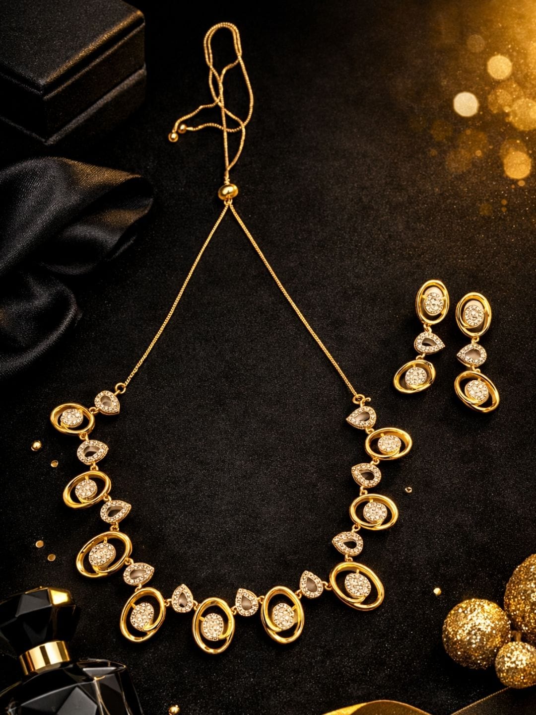 Gold tone American diamond oval necklace and earrings set with adjustable chain, elegant AD party wear jewellery for women